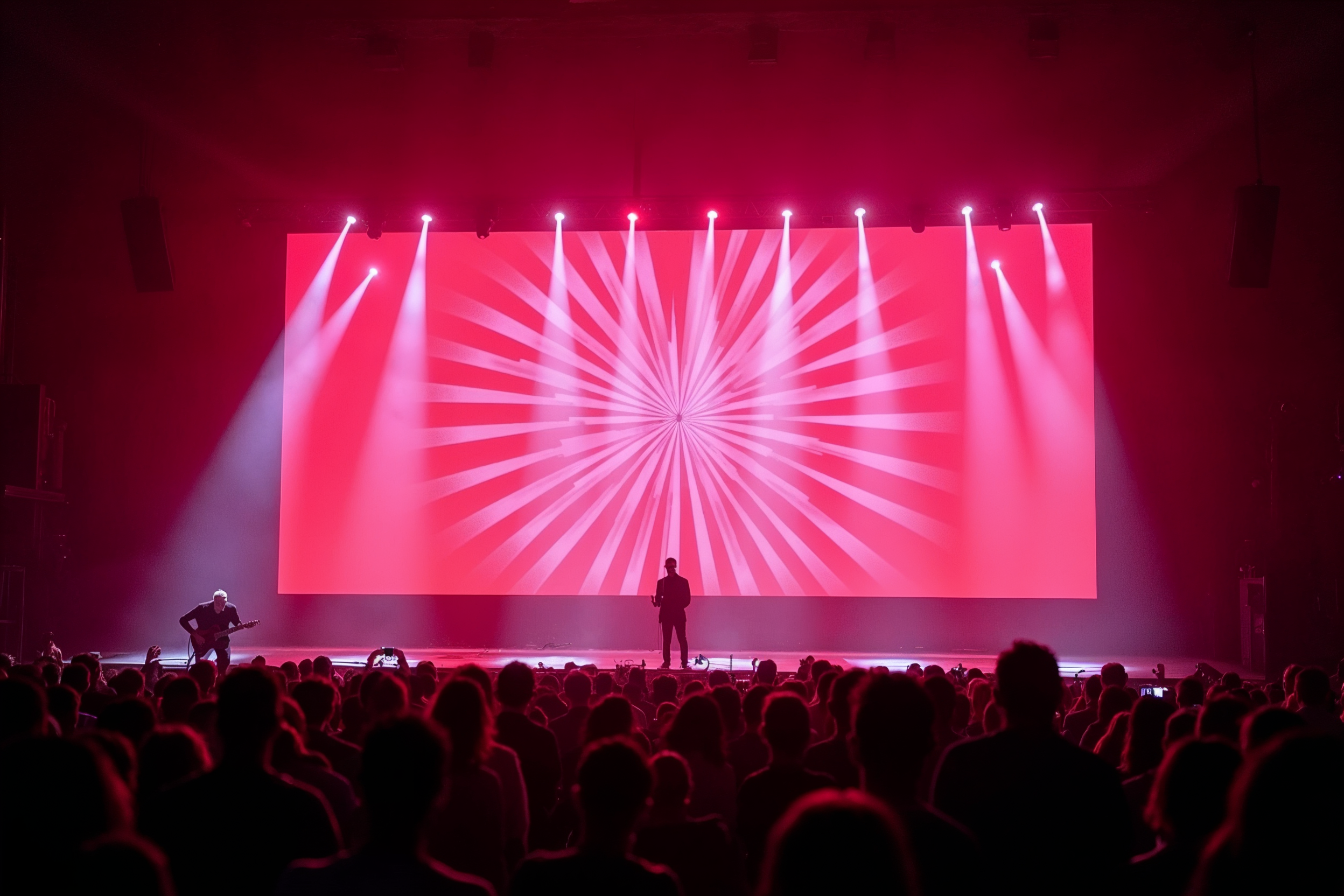 Gece festival sahnesi altı ışık hüzmesi ve tam LED duvarıyla